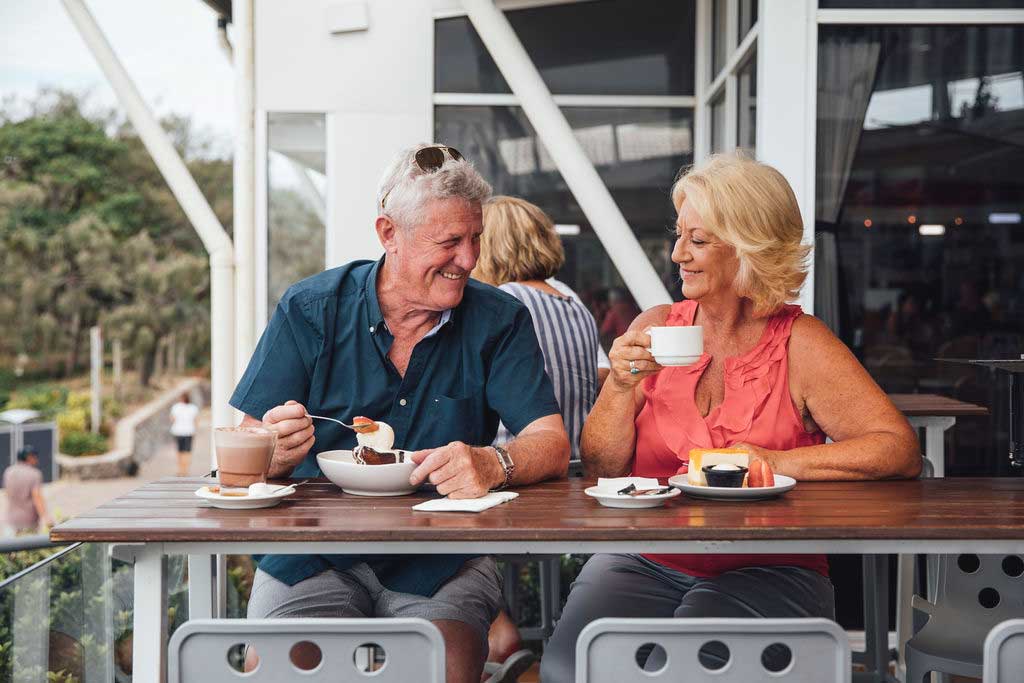 mooloolaba-surf-club-elderly-couple-enjoying-coffee